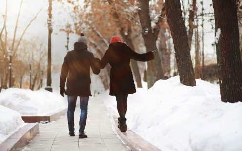 Young couple walking through the winter city; Shutterstock ID 1487004524; purchase_order: Urban desiccation; job: ; client: ; other: 